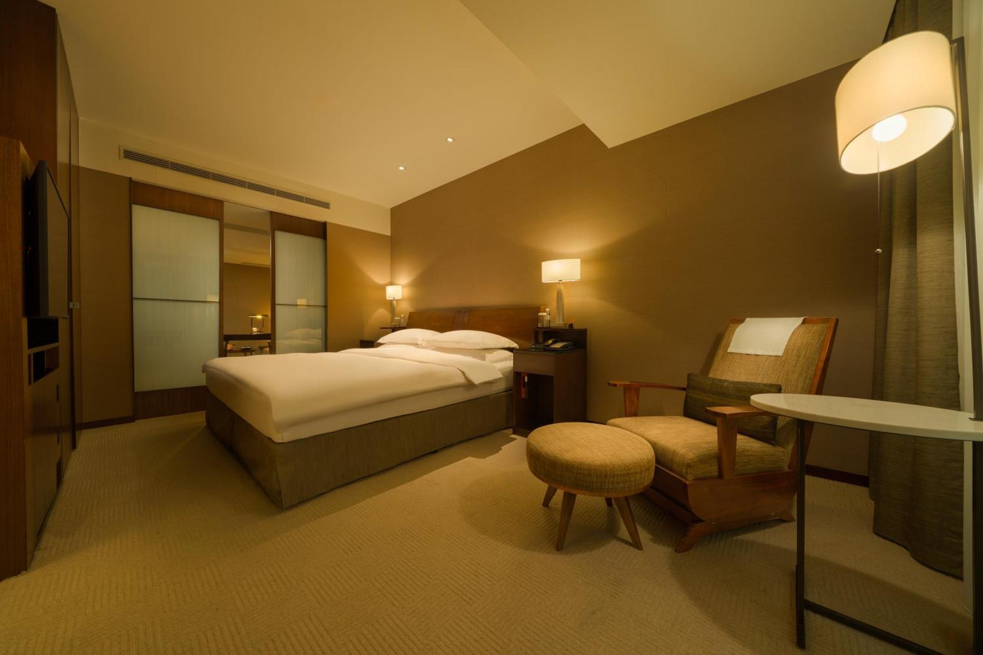 Les Suites Taipei Ching Cheng Habitación foto